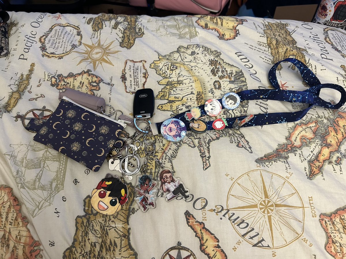 Anime__Writer's tweet photo. Updated my landyard 🥰 I still have the buttons! @JJGrelle @herracingmind https://t.co/VeAM6KTzOR