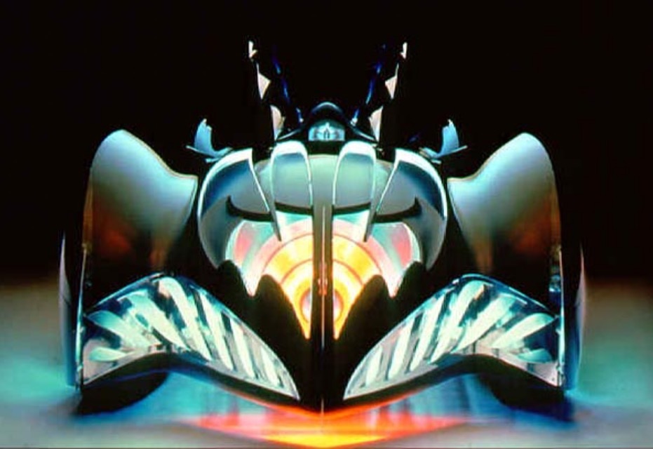 Pomotional/Publicity Photo of the Front of The Batmobile from Batman & Robin, neon lights and all! Even with the all the toyetic design choices like the open canopy this is one of my fave movie Batmobiles (next to the Burton Batmobile).