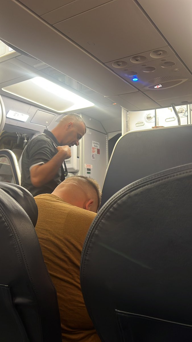 This man is trying to buy water for his kid and <a href="/SpiritAirlines/">Spirit Airlines</a> airlines won’t let him PURCHASE water while on the ground. Our flight is 2 hours delayed. #dobetter