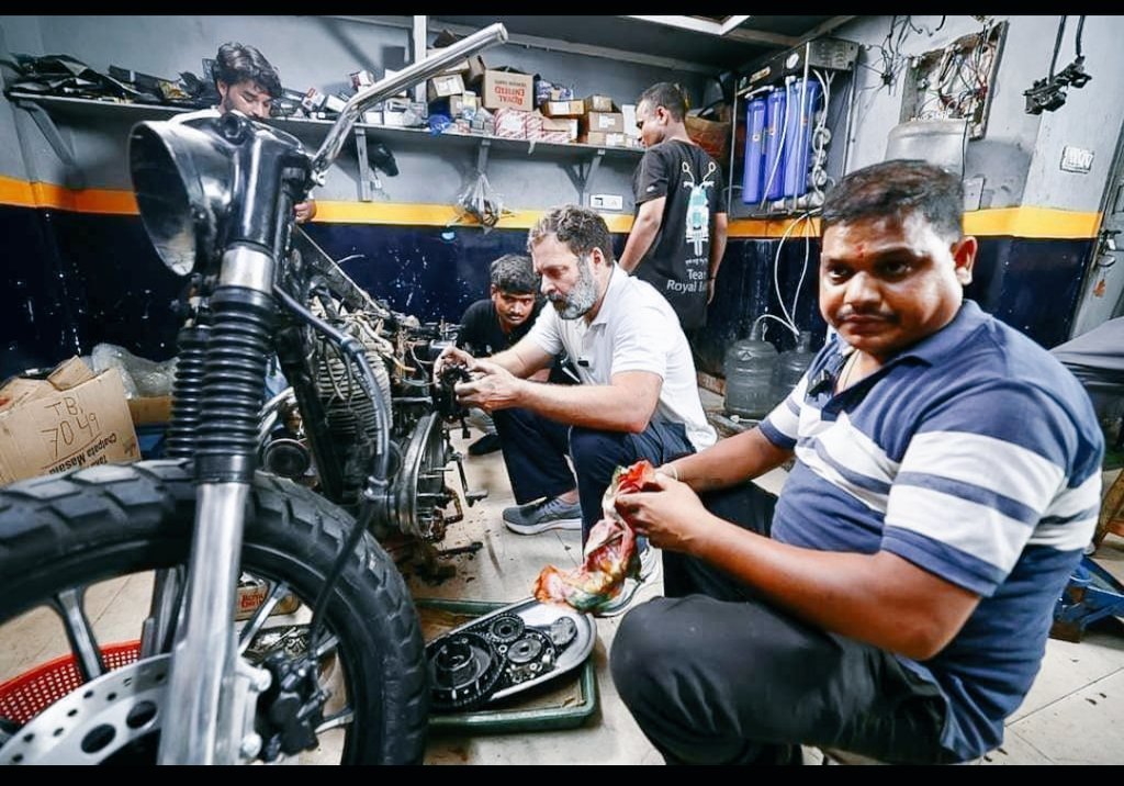 In the realm of greasy hands and engine roars, these two gearheads are crafting their dream ride. Witness the magic unfold! 🧑‍🔧🧑‍🔧 #MotorcyclePassion #DreamMachine #MotorcycleCraftsmanship
#RahulGandhiHopeOfIndia 
#CongressParty