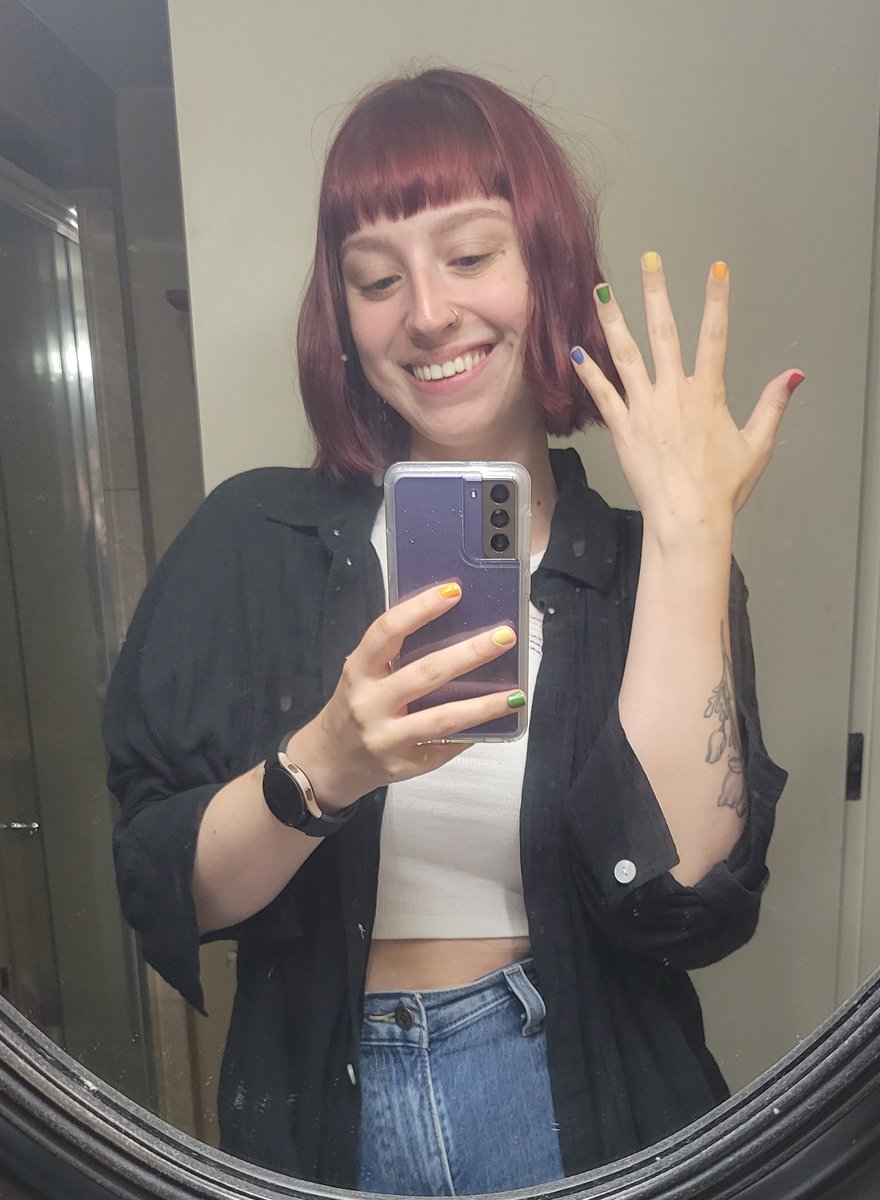 rainbow shirt and nails for the last day of pride month