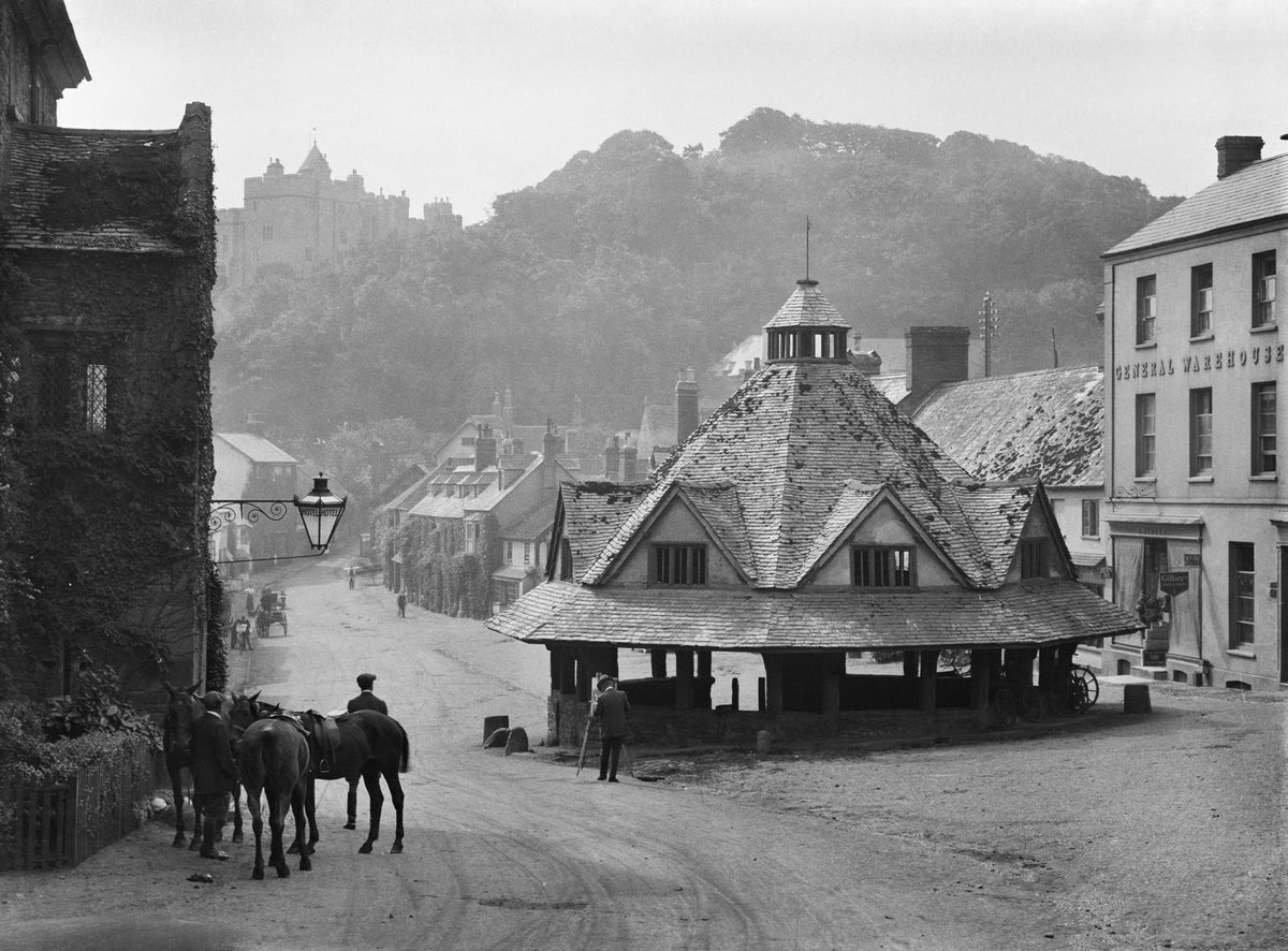 Built in 1609, Dunster Yarn Market in Somerset is a timber-framed octagonal market hall still standing today, a monument to Dunster's past as the centre of the wool trade.

This photograph was taken between 1850 and 1900.