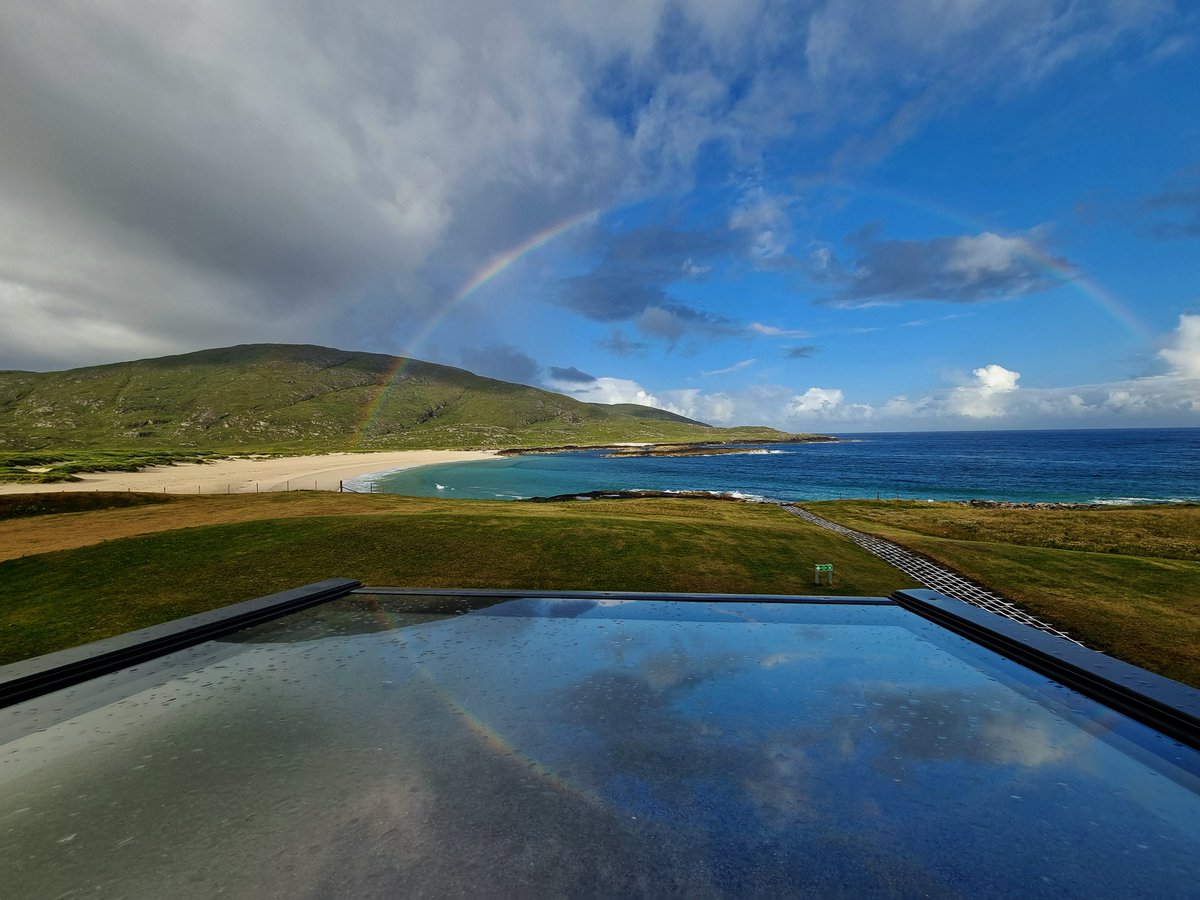 Reflective #rainbow over Tangasdale Beach on the #IsleOfBarra #OuterHebrides #Scotland