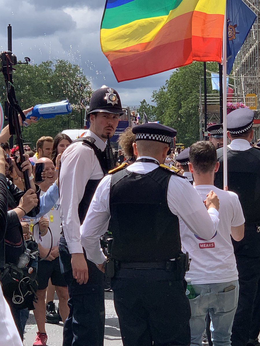 Police remove just stop oil protestors attempting to put a halt to the start of the pride parade in Piccadilly