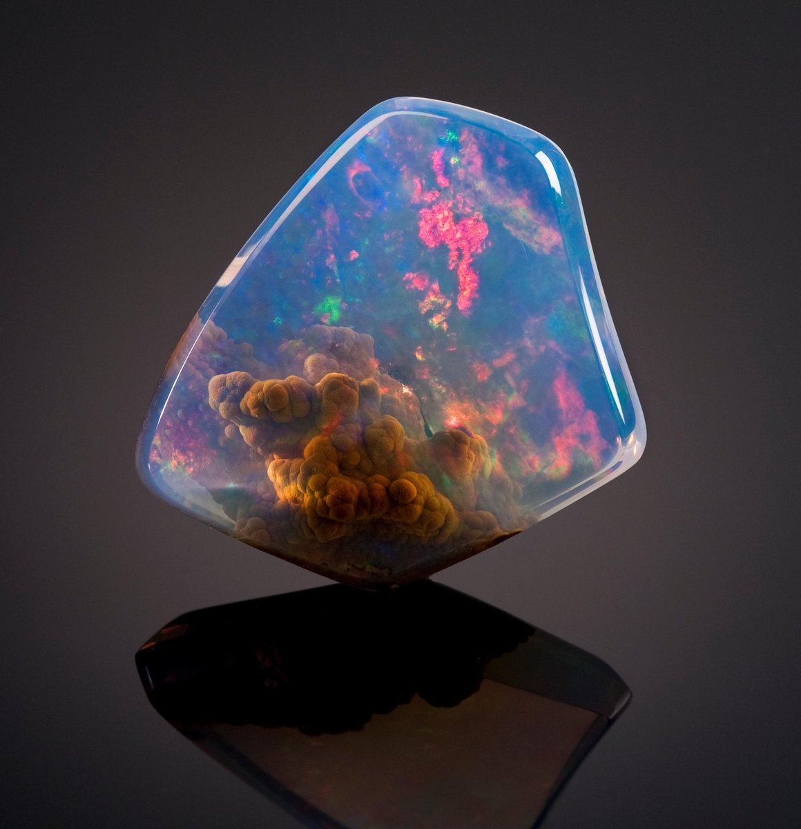 Rainmaker1973's tweet photo. This large polished opal's inside, which has a botryoidal jasper formation constituting a unique inclusion, closely recalls nebulae in space 

[source: https://t.co/R7jjJ7myOQ] https://t.co/xOHUmWDmDK