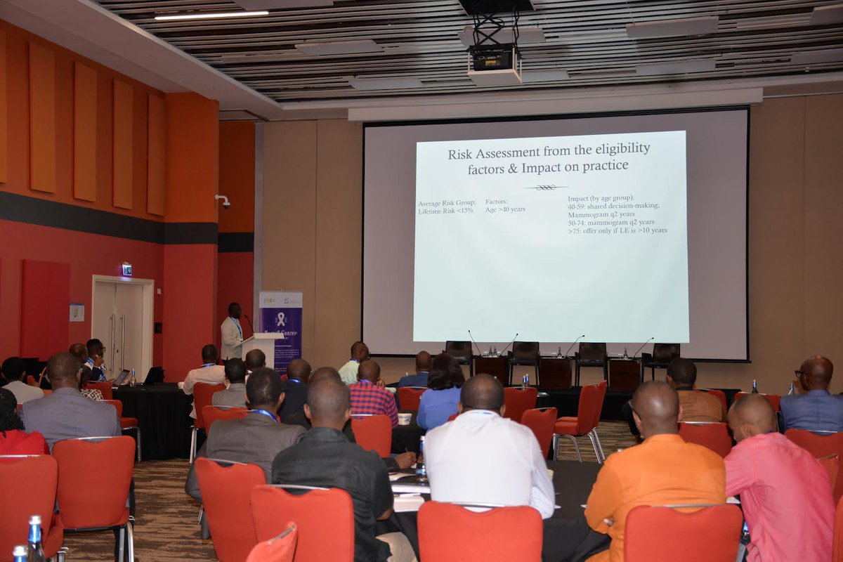 Dr Achille Manirakiza sharing his presentation on the “Re-Thinking Breast Cancer Screening in Africa”