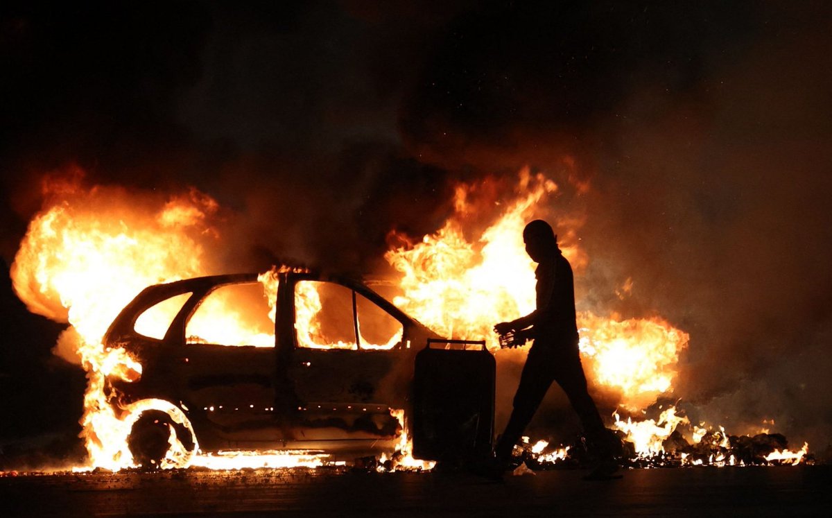 There has been some incredible photographs from France over the past few days as her cities teeter on the edge of breakdown. 📸Richard Bouhet / <a href="/AFPphoto/">AFP Photo</a>  telegraph.co.uk/world-news/202…