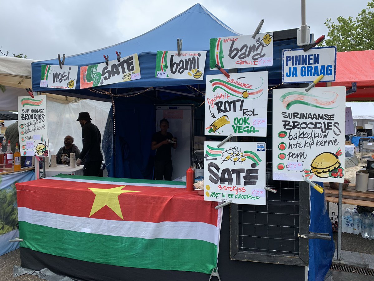 Hackknife's tweet photo. Eager to deep dive into Dutch cuisine for the next few days - of course, the Stamppot with local beer is a great pair, but we were also lucky to encounter a Caribbean fest where I could get a Surinamese broodje with salt cod and a roti for lunch… https://t.co/Uhen2xUKOE