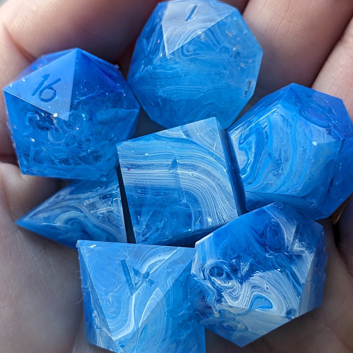 detectmagicdice's tweet image. These Blue Dice Want To Be Agates When They Grow Up

What color would you ink them? I love the end result of inking dice, where a perfect color can tie a set together, but by golly I hate picking colors.

#bluedice #sharpedgedice #swirldice #handmadedice