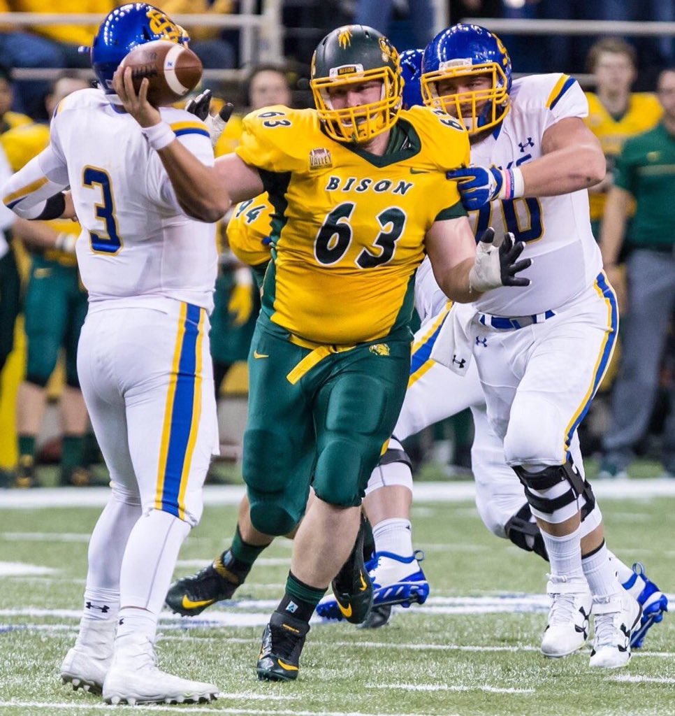 jsteck65's tweet photo. Bison Nation, we have 63 days until NDSU starts the 2023 season! Today, we honor a former player who epitomized the toughness and grit needed to play in the trenches and became a dominant force against the opposition, @AaronSteidl38!! #BisonFBCountdown #LetsGoBison #HornsUp🤘 https://t.co/FEhjKrhMee