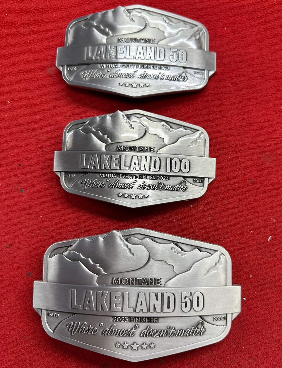 For one year only, western style finisher belt buckles in brushed silver steel. Yee Haw.