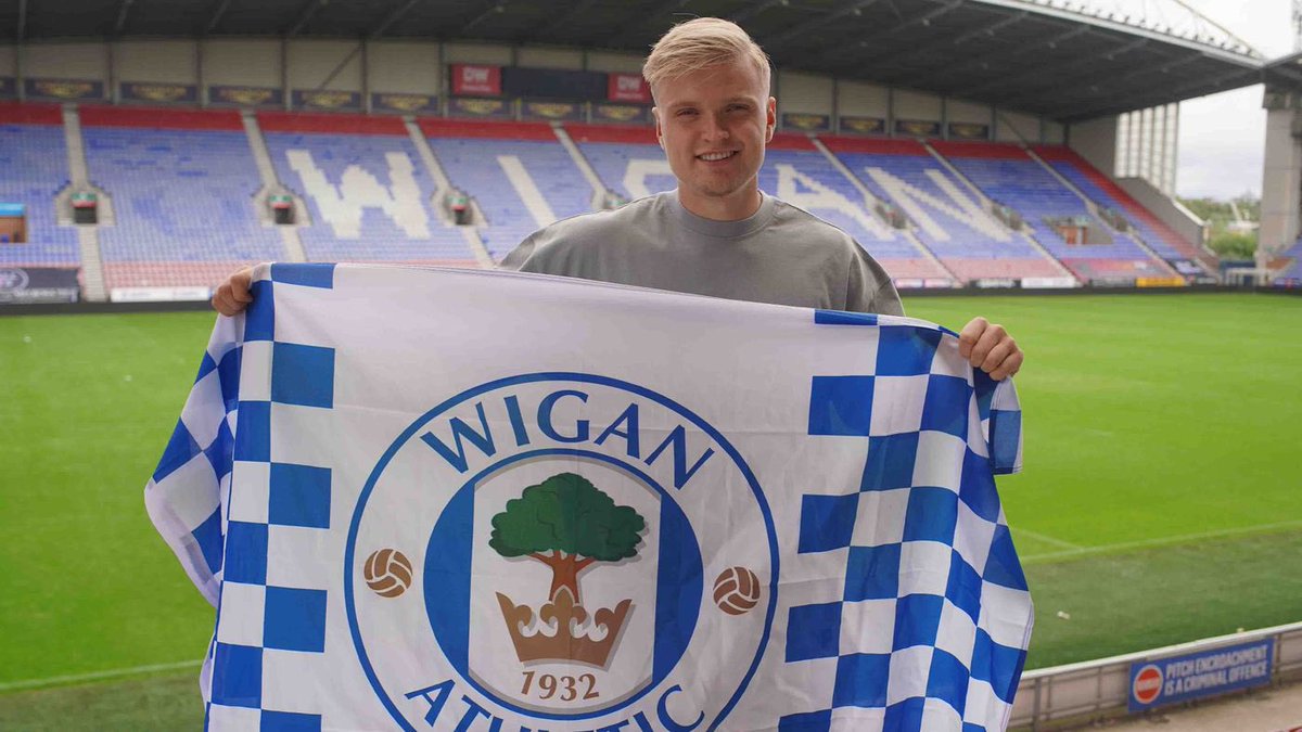 Matt Smith has signed for Wigan after being released by Arsenal