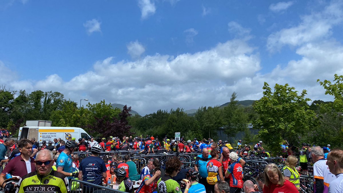 The 170km Ring Of Kerry Charity Cycle - helping Tony Daly (on left) & the army of volunteers at the Kenmare stop provide food water tea & encouragement (Joop Duyn, centre, cycling it) as they face the final leg over Molls Gap