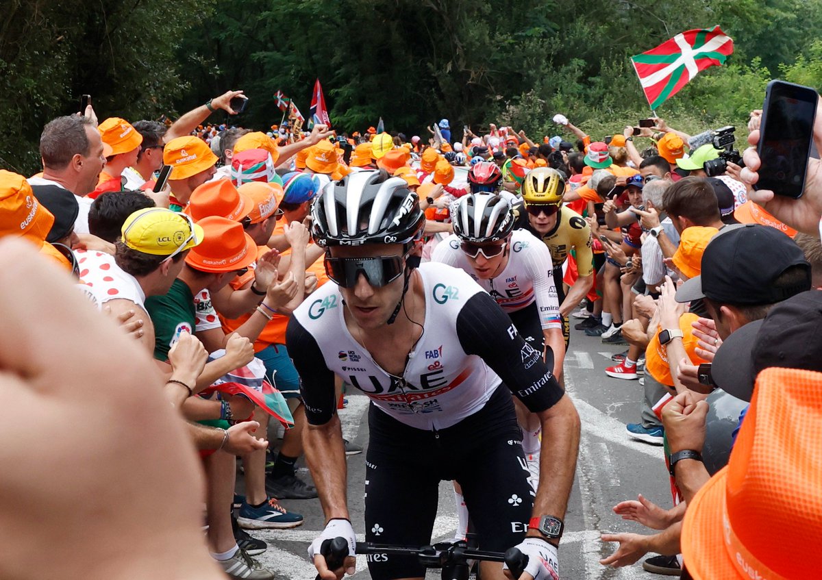 Cycling - Tour de France - Stage 1 - Bilbao to Bilbao - Spain - July 1, 2023 UAE Team Emirates' Adam Yates, UAE Team Emirates' Tadej Pogacar and Team Jumbo–Visma's Jonas Vingegaard in action with riders on pike Bidea during stage 1 REUTERS/Vincent West
