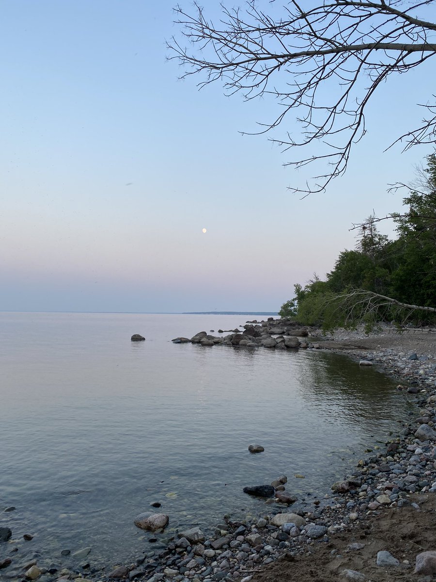 This rocky beach by Traverse Bay sure is pretty with the belt of Venus in the distance.  #VictoriaBeach #Manitoba #moon