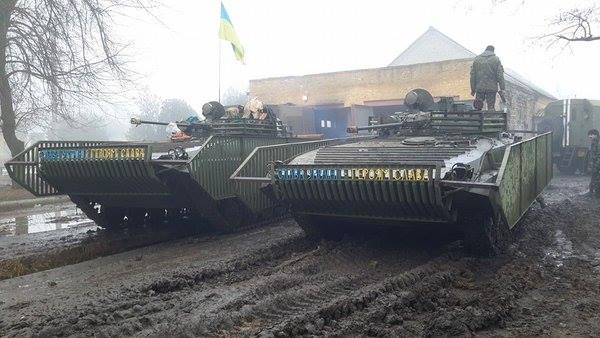 #Ukrainian BMP-2s with improvised slat armour, Donbas region, 2015.