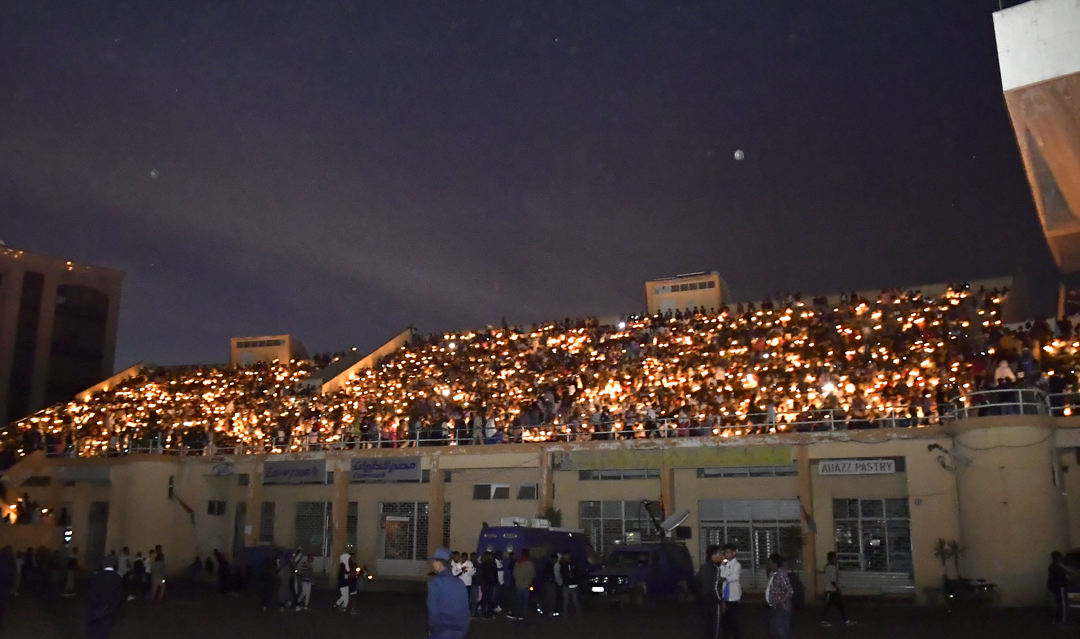 hawelti's tweet photo. Candle light vigil in Asmara on the eve of Martyrs Day; Liberation Avenue and Bahti Meskerem full to their rims with tens of thousands of residents paying homage to Eritrea's heroic Martyrs. https://t.co/ZU1wrp5pyl