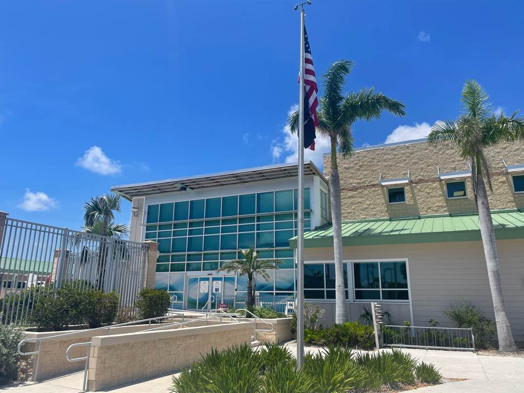 SynergyNDS's tweet photo. FMIT TurnKey Recovery Project Spotlight: SynergyNDS continues repairs at the Sanibel Recreation Center after the building was severely damaged by Hurricane Ian. Crews have finished installation of a new gym floor and are currently completing exterior repairs to the building. https://t.co/ve5m0ClBks