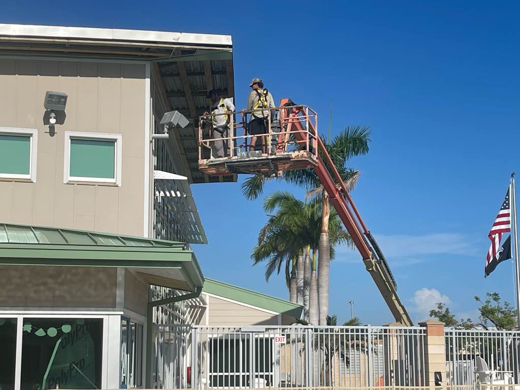 FMIT TurnKey Recovery Project Spotlight: SynergyNDS continues repairs at the Sanibel Recreation Center after the building was severely damaged by Hurricane Ian. Crews have finished installation of a new gym floor and are currently completing exterior repairs to the building.