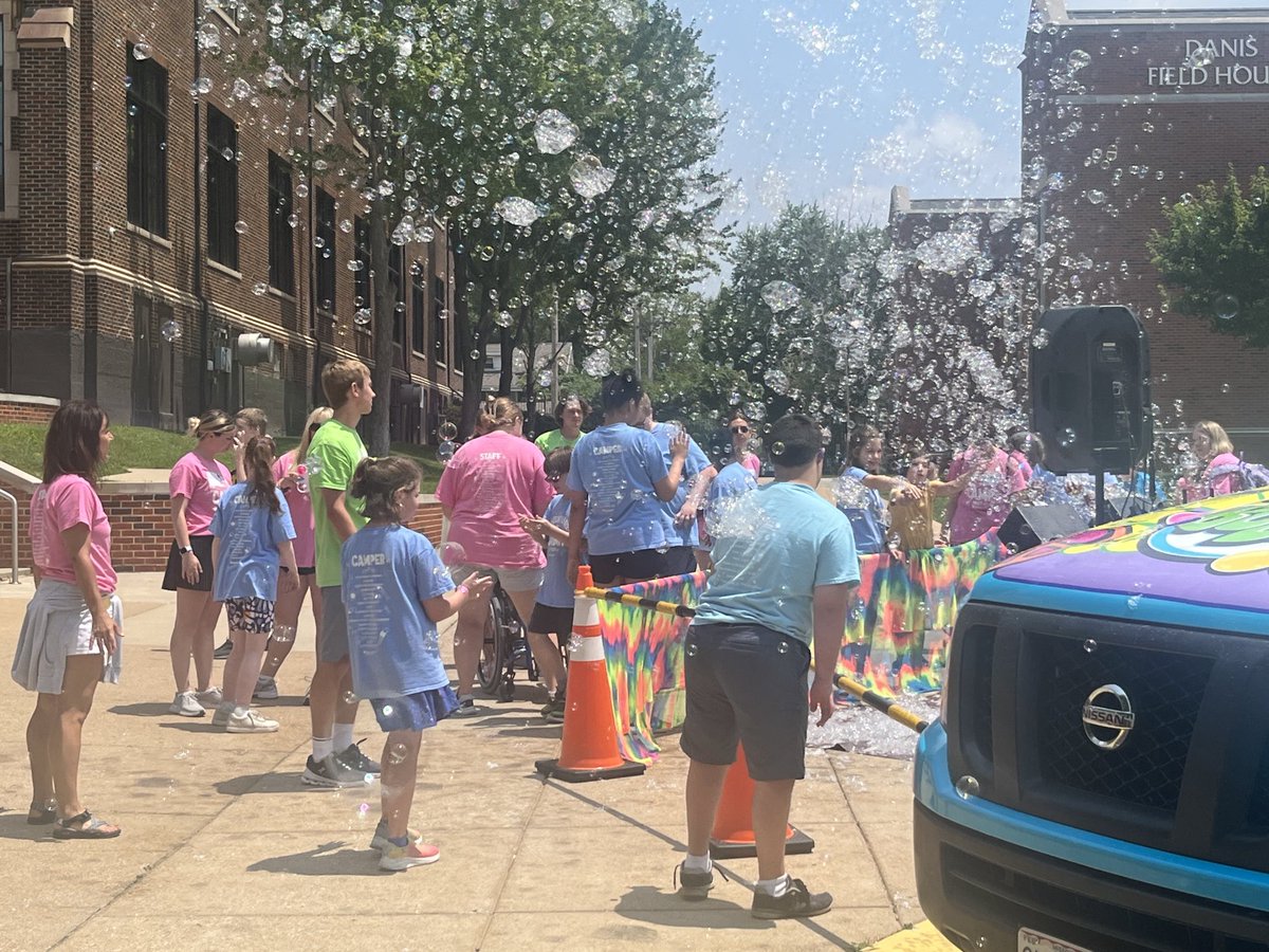 Sluhpresident's tweet photo. All of our wonderful friends from Variety are w us today! So much fun for all the kiddos as the Bubble Bus also made a visit. St. Ignatius had a great seat to watch all the joy-filled excitement. #AMDG #joy #SLUHSummer https://t.co/6c1eE2q7eK
