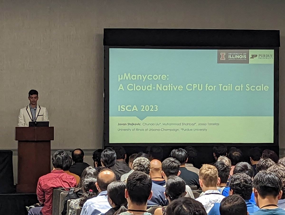 msbaz2013's tweet photo. Jovan Stojkovic (@jovanvr1997), facing a full-house, talking about our μManycore: Cloud-Native CPU at @ISCAConfOrg 2023! 

Proud advisors and collaborators: @josep_torrellas, @msbaz2013, and Chunao Liu!

@UofIllinois | @PurdueCS | @ace_computing https://t.co/CcuF2CtOdG