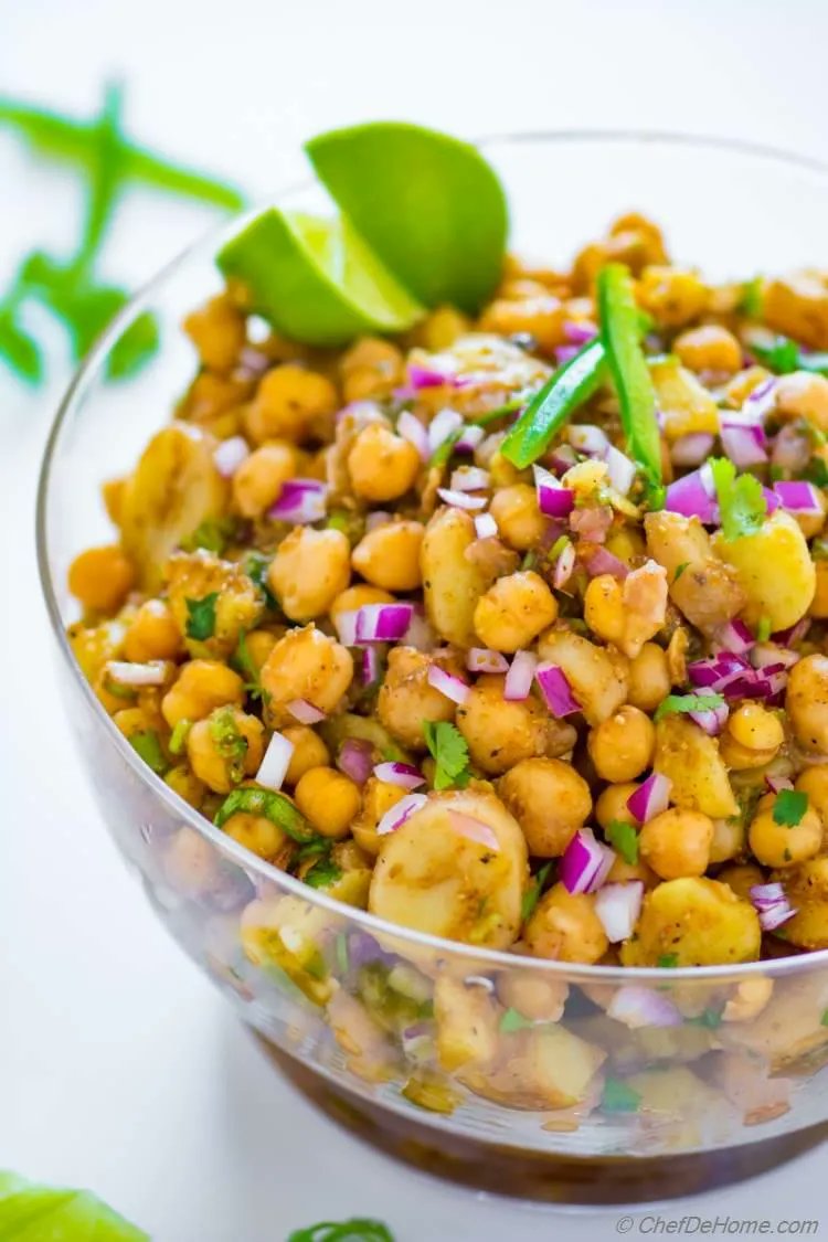 👉Potato Chickpea Salad 🔗bit.ly/2NWiYWE Potato and Chickpea Salad with sweet, sour, and spicy tamarind dressing. Famous by name of Aloo Chana Chaat or Aloo Chole Chaat, this potato chickpea #salad is bursting with flavor of Indian spices.