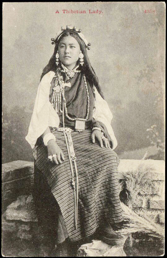 Portrait of an unidentified woman from Tibet. Photographed in the 1910s.