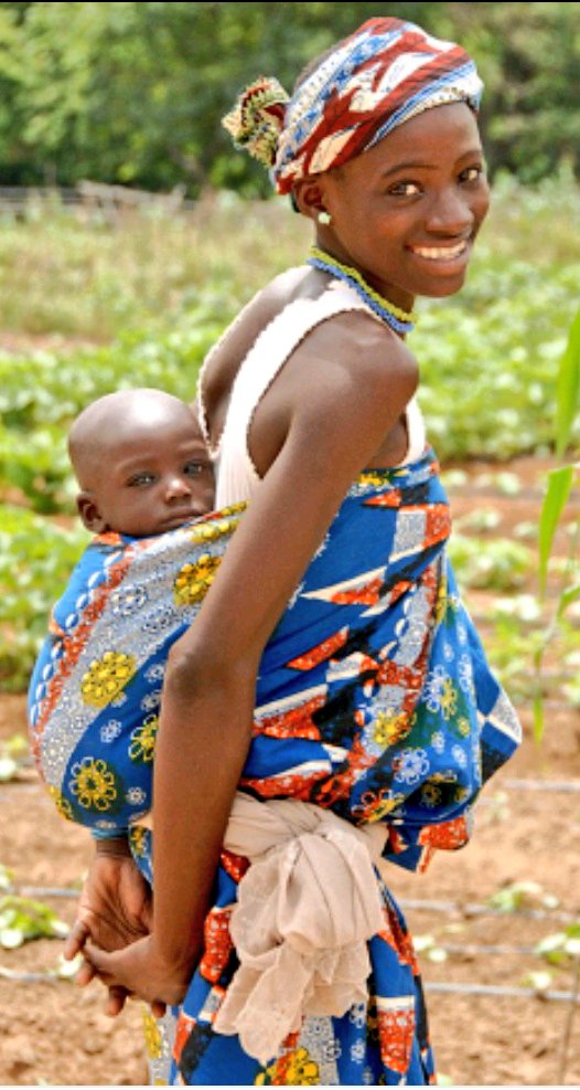 'Embracing the Earth's embrace, a mother's love knows no bounds. Her strength nurtures generations, sowing seeds of resilience and hope.  #MotherPower #StrengthInLove #NurturingLegacy'