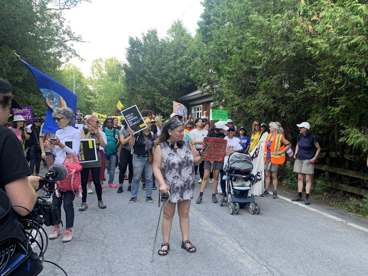 Marchers reach Roxham Road after 3 day hike to protest the closure of the border to people seeking refuge from danger and oppression