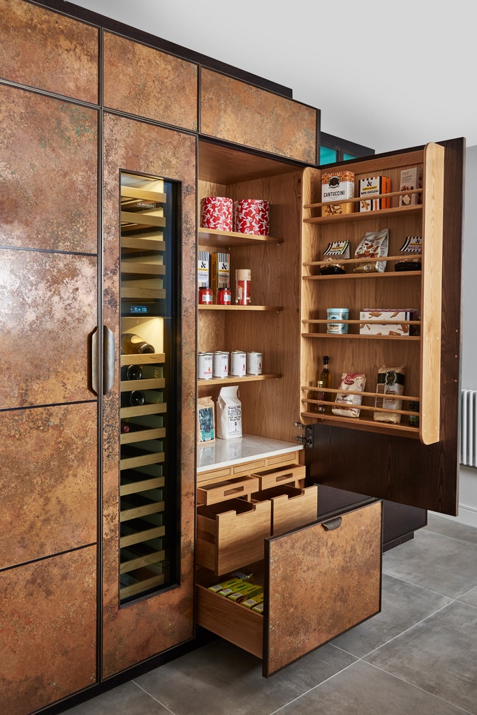 Using artisan joinery methods, married with cutting edge design, these kitchens integrate copper panels into wooden or painted cupboards, and blend the warmth and comfort of a traditional kitchen with a very contemporary design aesthetic. #LedburyStudio #copperkitchen