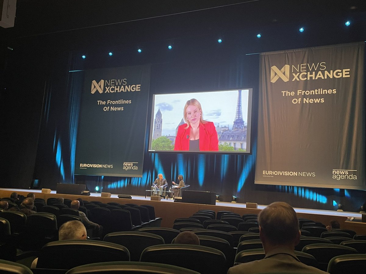itz_aliya's tweet photo. Hearing from the courageous Marina Ovsyannikova - the journalist who held up a sign saying “stop the war- they’re lying to you” on live TV. She lives under constant security and was unable to be here in person today #NewsXchange https://t.co/67KyXQn45J