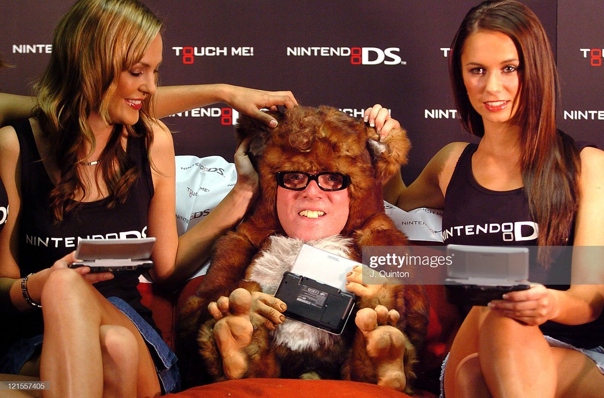shitbritishpics's tweet photo. The Bo Selecta Bedtime Bear launches the Nintendo DS at the Virgin Megastore, Oxford Street (2005) https://t.co/a7cxdzh3GT