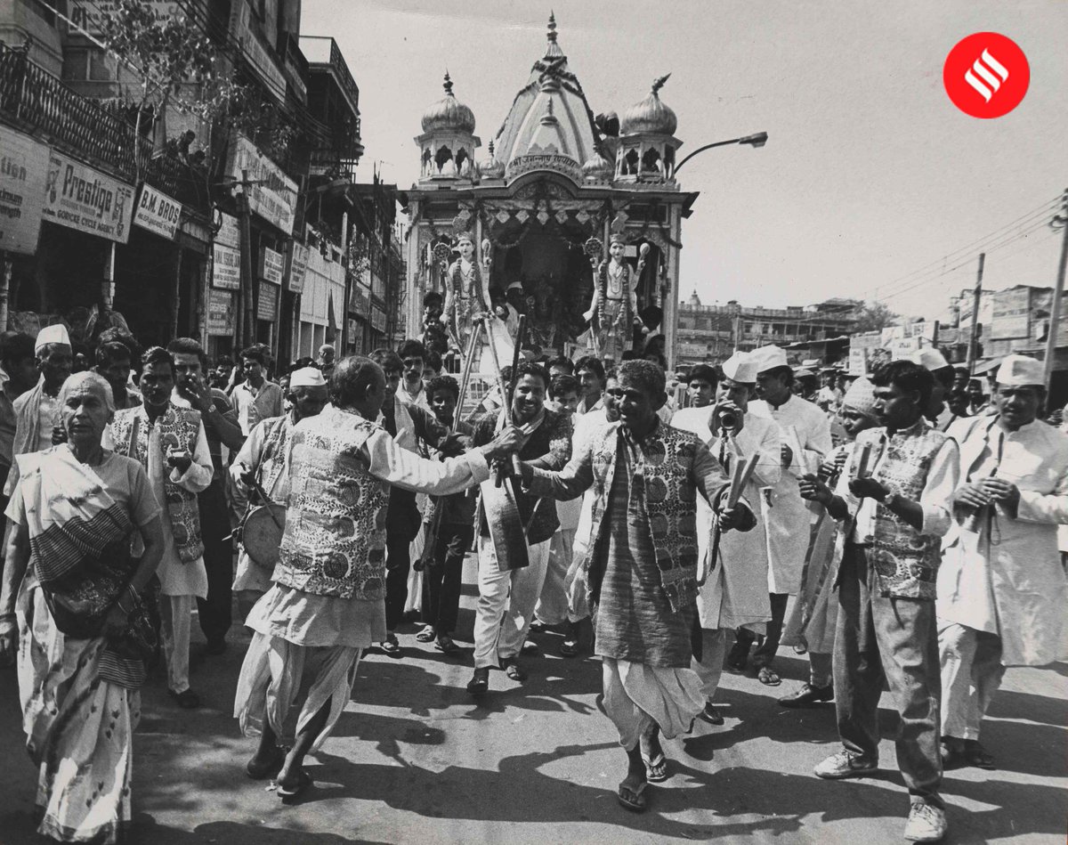 Devotees perform a dance in the procession of Lord Jagannath #RathYatra at Chandni Chowk in New Delhi on July 2, 1992. 

Express photo by RK Dayal.

#ExpressArchives