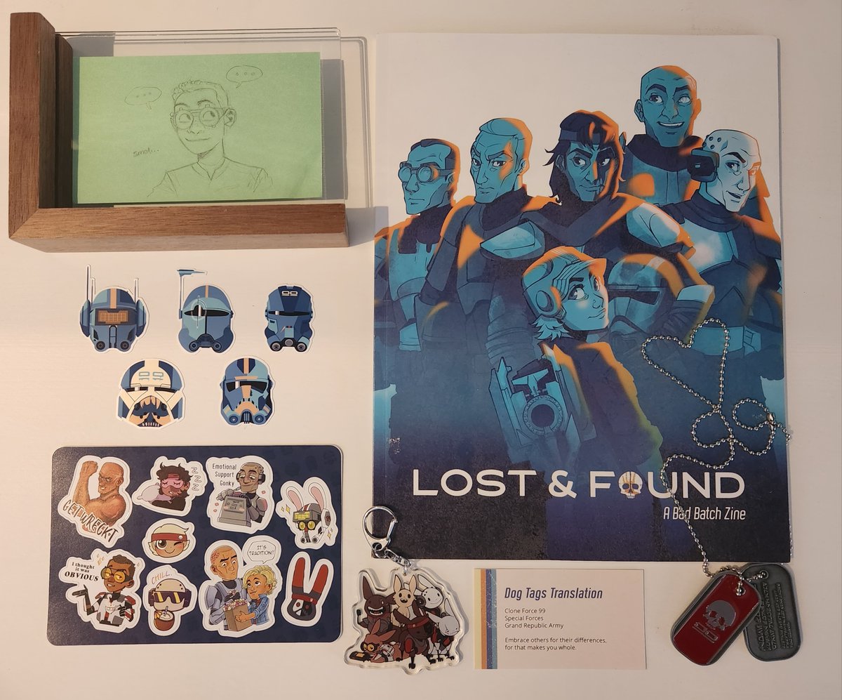AmberOwl24's tweet photo. My @badbatchzine contributor bundle! (Yes, I have two dog tags. I talked my parents out of their merch!)

My hands-down favorite part is the cadet Tech sketch from @CloneEnthusiast that wonderfully matches the age 10-12 Tech from my story! 

I told you I was going to frame it!🧡 https://t.co/47Asx0UfQX