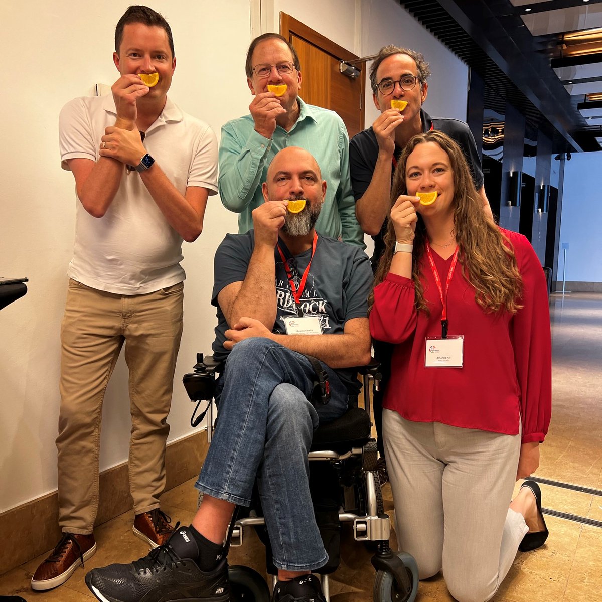 FSHDSociety's tweet photo. Today is #WorldFSHDDay! We are sharing orange slice photos from last weekend's World FSHD Alliance gathering in celebration! Join us in recognizing this day by posting your selfie alongside your unique story! Today is YOUR day. #CureFSHD https://t.co/nBwUdXSq3s