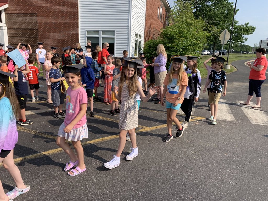 WPSPride's tweet photo. Our 3rd Graders paraded around bus loop today as we cheered them on!  Off to Manchester school they go!!! https://t.co/fvtor5lgnZ