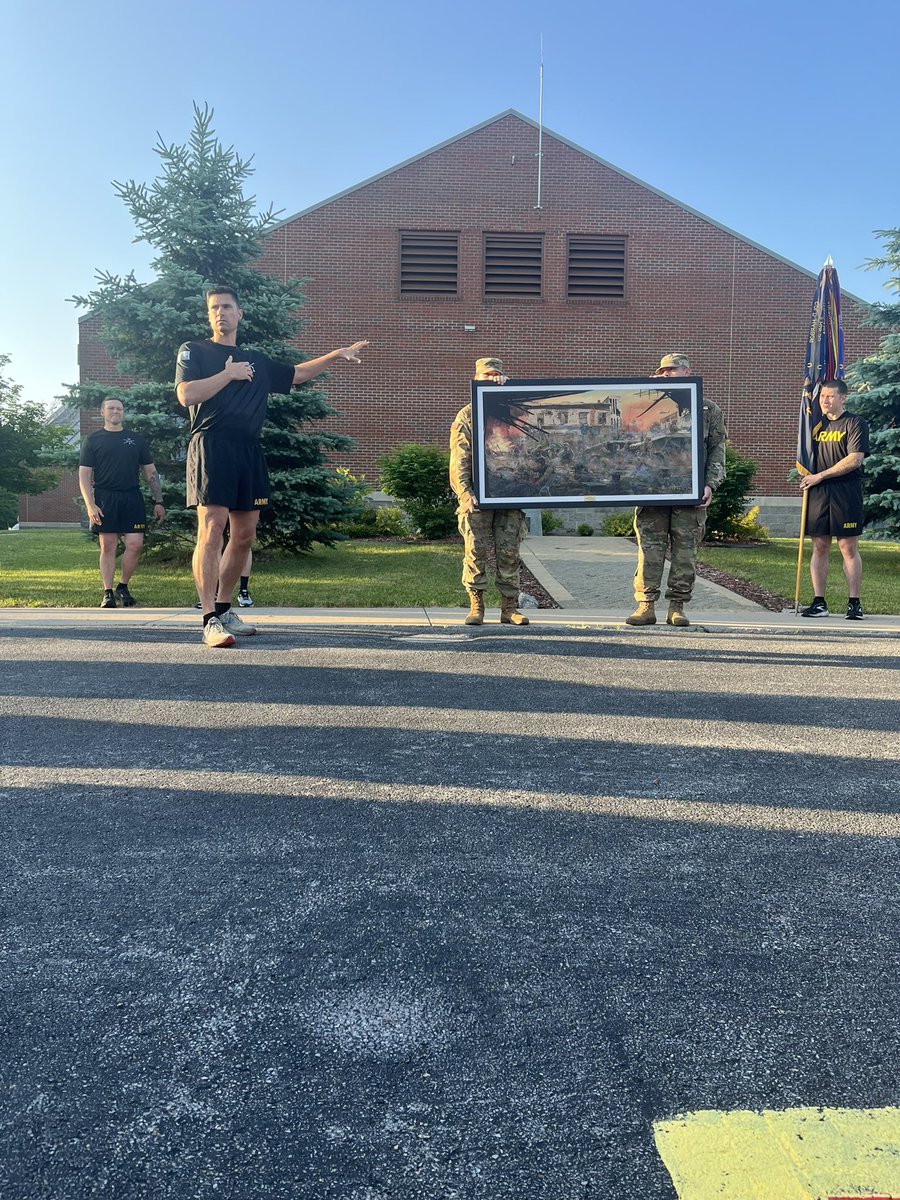 2_14Infantry's tweet photo. 2-14IN participated in the Division Run this morning to kick off Mountainfest week! We started the morning with Chaplain Struecker and Keni Thomas presenting 2-14 with a print of the Battle of Mogadishu depicting all 4 units involved in the intense firefight #ROTL https://t.co/Slj99wxtbX