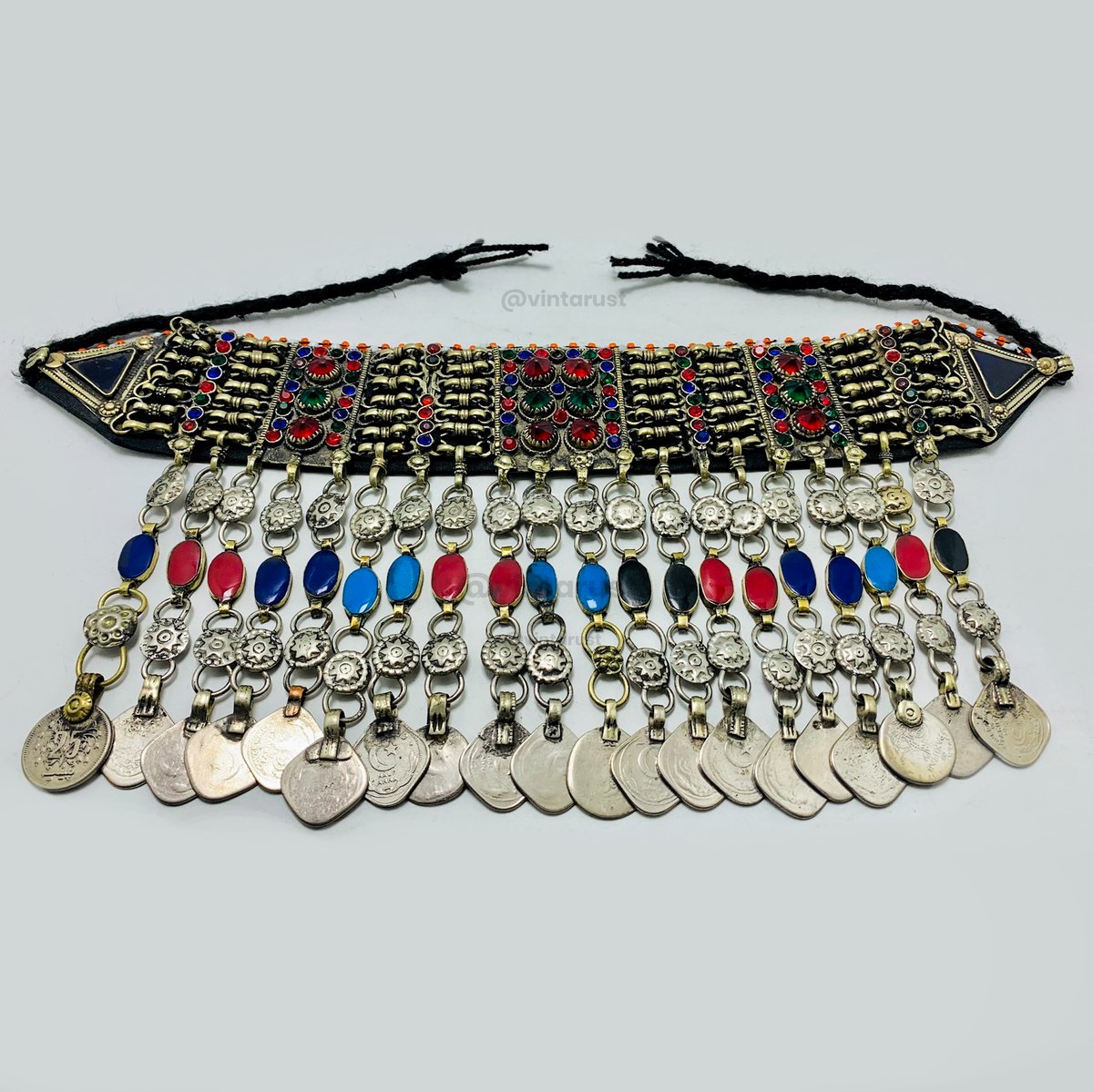 Multicolor Tribal Choker Necklace With Coins. 

Shop Now:
buff.ly/3pdLWZu

#chokerjewelry #tribalchoker #vintarust #ethnicjewelry #silverhuedbeauty #finetouches #shopsmall #ancestralcharm #bridalaccessory #versatilestyle #chokerlove #necklaceaddict #jewelryobsession