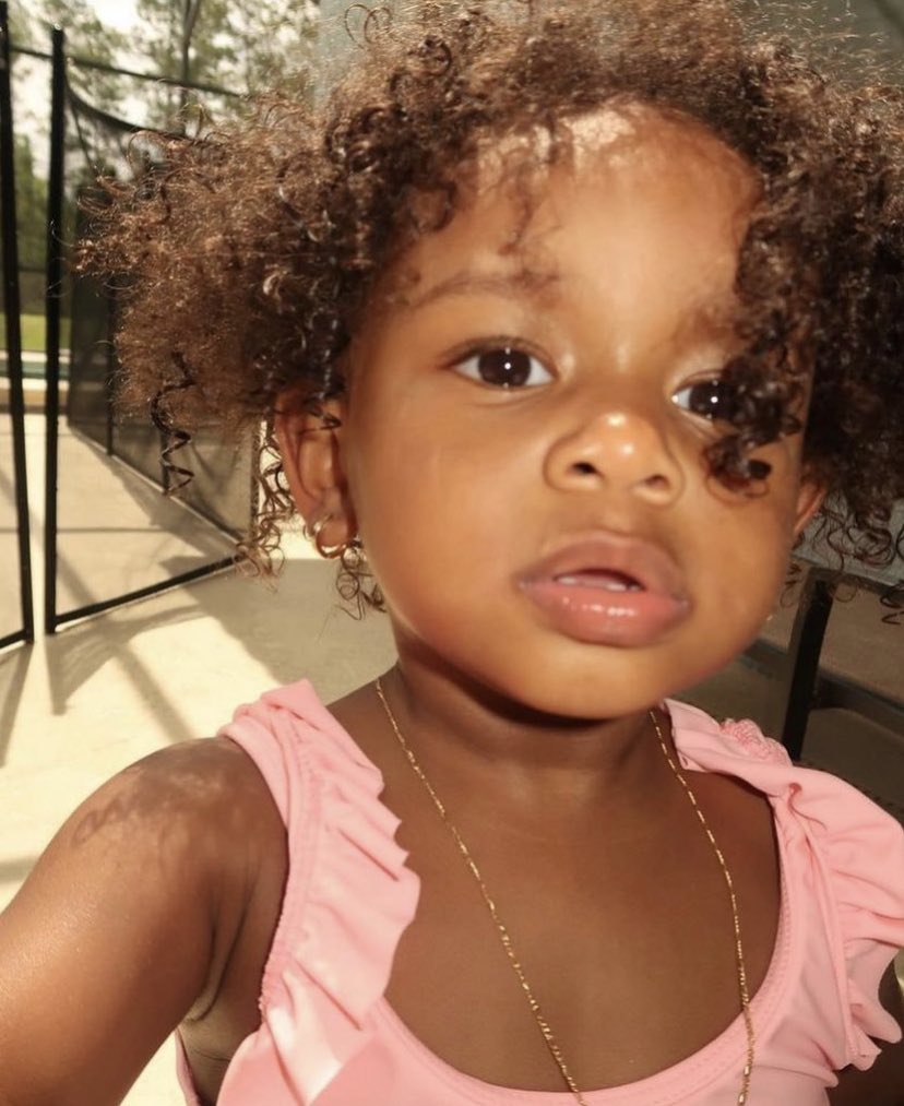 happiness is a curly haired girl