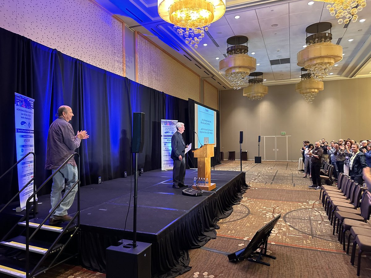 Hippotas's tweet image. Standing ovation after Don Chamberlin’s SIGMOD’23 keynote. We have approx 1000 attendees at SIGMOD this year. 

#sigmod23