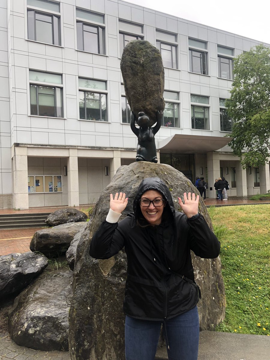 TWolvesJHS's tweet image. Bethany standing by WWU statue of the world on the shoulders statue! 😃🌎💪