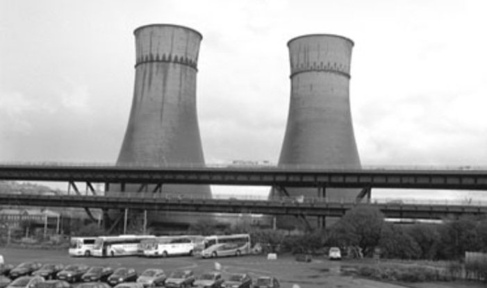 Cooling Towers and Tinsley Viaduct with Meadowhall Shopping Centre Coach Park in the foreground