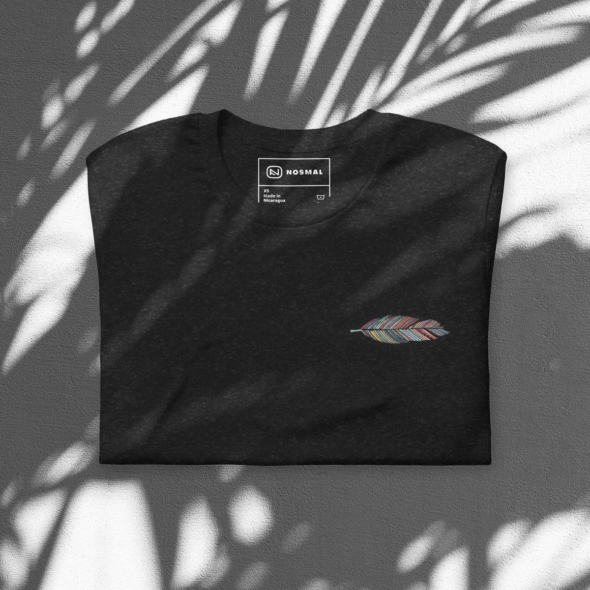 Elevate your style with this multi-color Prism Feather embroidered unisex t-shirt designed by <a href="/morganaatx/">ml</a>. Available in White, Heather Black, and Heather Orchid Bella+Canvas unisex tees.

tinyurl.com/t8yddykm 

#Fashion #Trendy #Embroidery