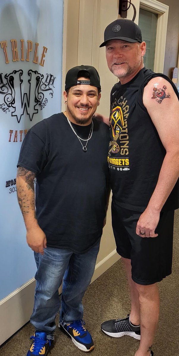 tmac_307's tweet photo. So Michael Malone continues to add to his legend as head coach of the @nuggets. He got a tattoo of Maxie the Miner holding the Larry O’Brien trophy. Shoutout to Mike Diaz from Triple W Tattoo who gave Malone his new ink. @DNVR_Nuggets @AltitudeSR #MileHighBasketball https://t.co/6BGp95Iu5T
