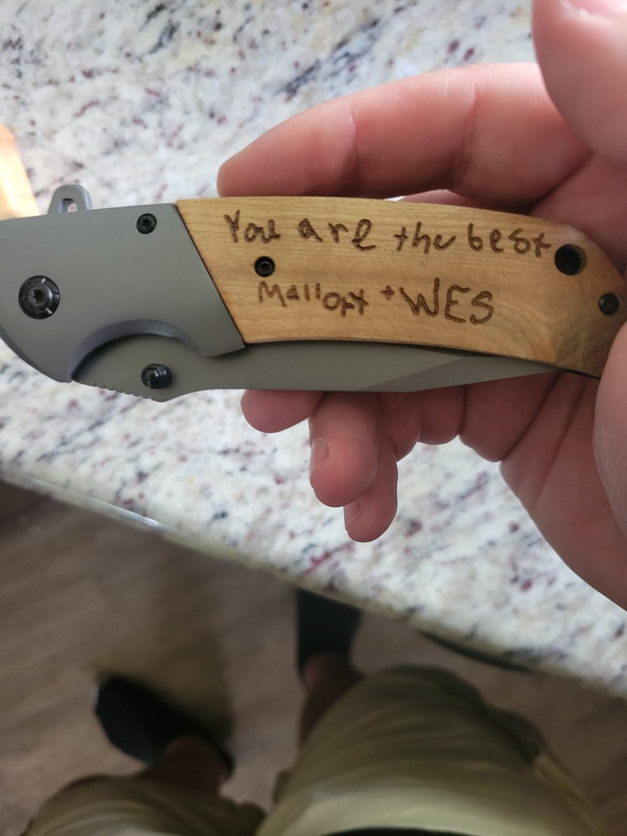 Took a couple days past father's day to get here but it was worth it.

I broke the tip off my other knife a bit ago so my kids replaced it with this.

Yes. That's Mallory's handwriting.