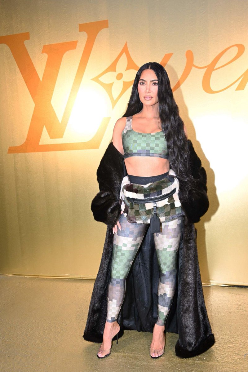 Kim Kardashian attending the #LVMenSS24 show