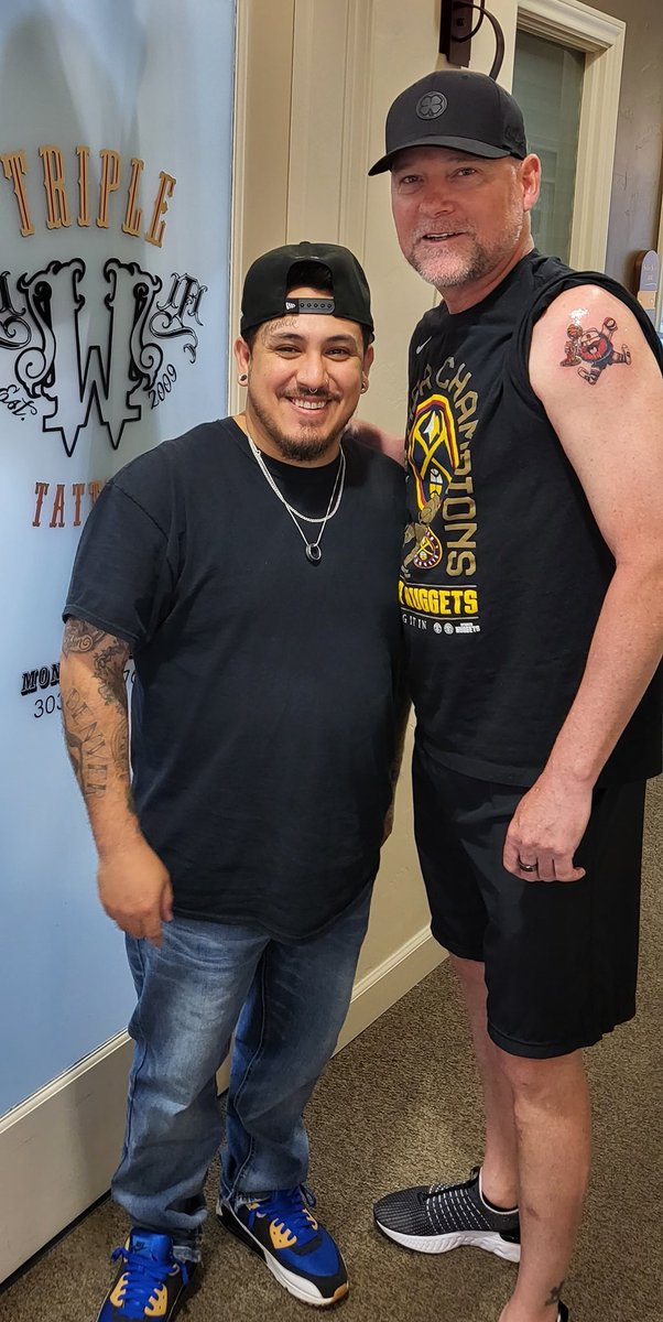 DenverChannel's tweet photo. Coach Michael Malone's coolness levels: 📈

Eight days after winning the NBA Finals, coach celebrated with a permanent reminder of his team and their accomplishment. 🏆

📸: Mike Diaz with Triple W Tattoos LLC https://t.co/hye2nRujv7