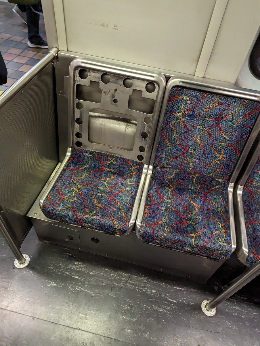 tfbuck's tweet photo. Hey @MBTA redline car 01714 could use some attention. Lots of seats that are missing or damaged. https://t.co/JhnJrN47y3