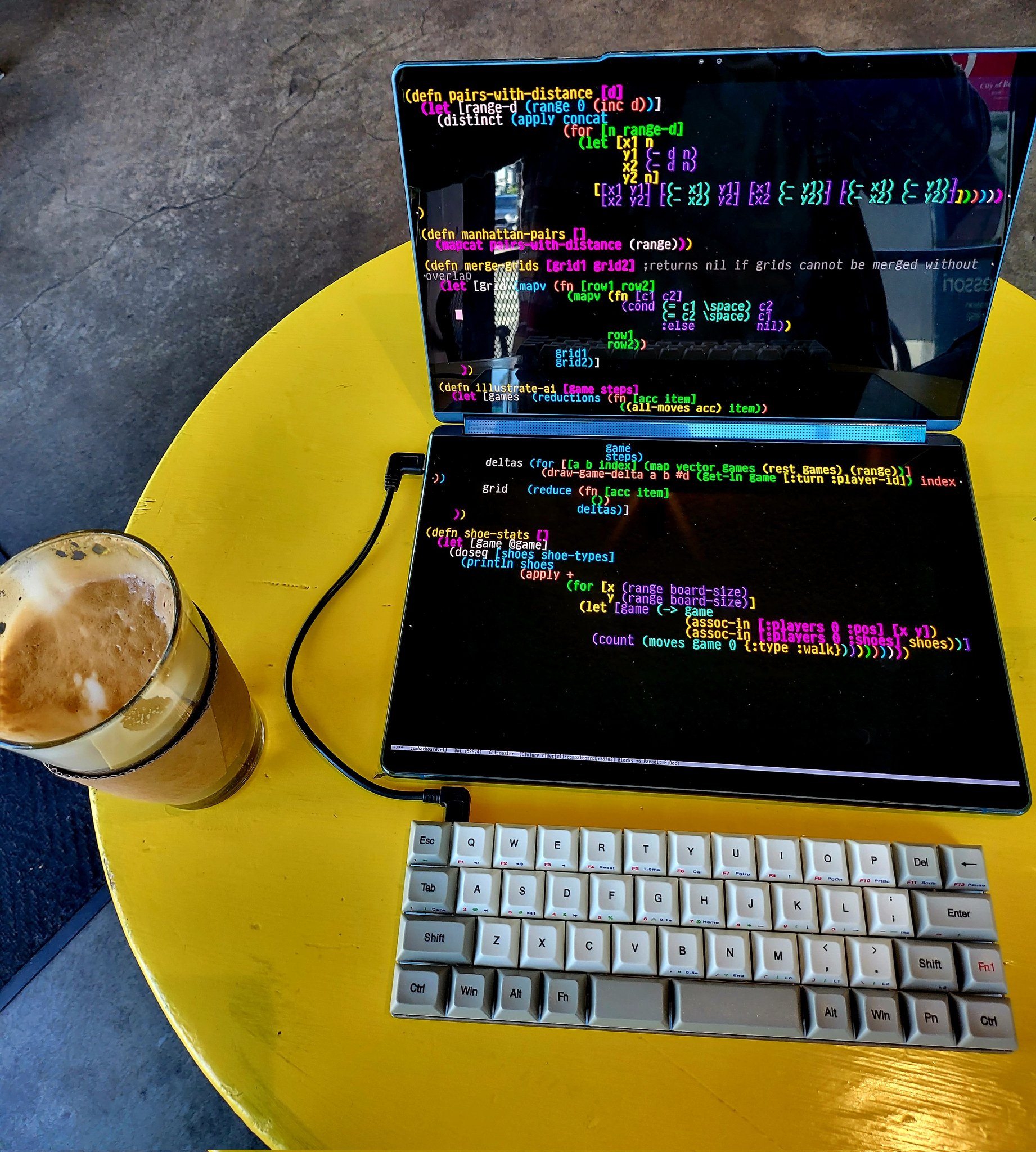 Conrad Barski on X: My new development setup: A Yoga Book 9i dual screen  laptop running emacs, with a Vortex Core 40% keyboard   / X