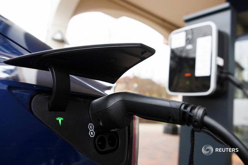 Reuters's tweet photo. Exclusive: Texas said it will require electric vehicle charging companies to include both Tesla's NACS standard as well as the CCS standard if they want to be part of a state program to electrify the state's highways using federal dollars https://t.co/EhAKifGcFg https://t.co/NYc0bVRUWq